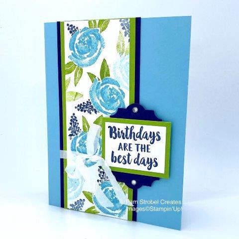 By creating your own patterned paper there is no limit to the colorful flowers you can make with Stampin'Up's Beautiful Friendship stamp set. Fresh colors of Balmy Blue, Granny Apple Green and Night of Navy were used. Stamp the largest image and then create a mask to place on top of the image before stamping the additional leaves and flower spikes. Find more of this stamp set to get inspired here https://www.pamstrobelcreates.com/beautiful-friendship-stamp-set
