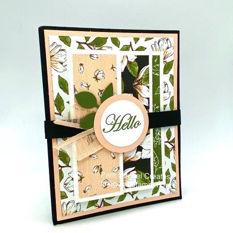 HELLO...it's center stage and part of the sweetly decorated belly band hiding a design underneath . Slide it off and find an accordian style card. Magnolia Morning stamp set using Magnolia Lane Designer Series Paper, Petal Pink, Mossy Meadow and Basic Black. Find the inside look at my website here :https://www.pamstrobelcreates.com/magnolia-morning-stamp-set